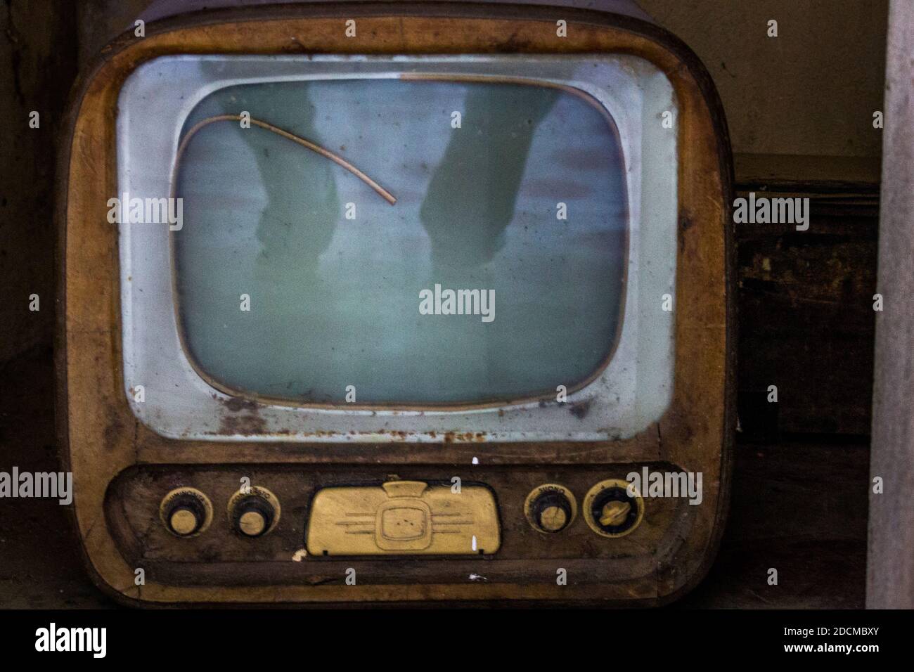 Picture of an Abandoned vintage television without remote control Stock Photo