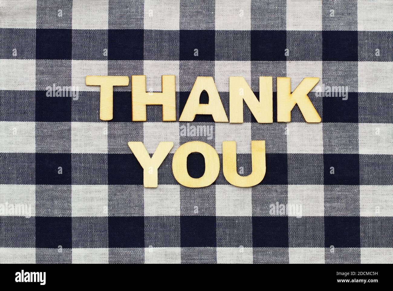 Thank you written on checkered surface Stock Photo