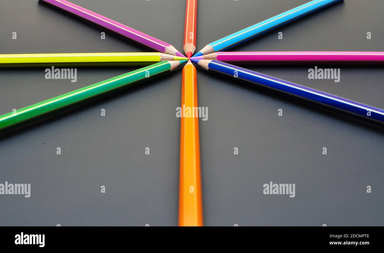 Many coloured pencils close up, metaphor of strategy and teamwork Stock Photo