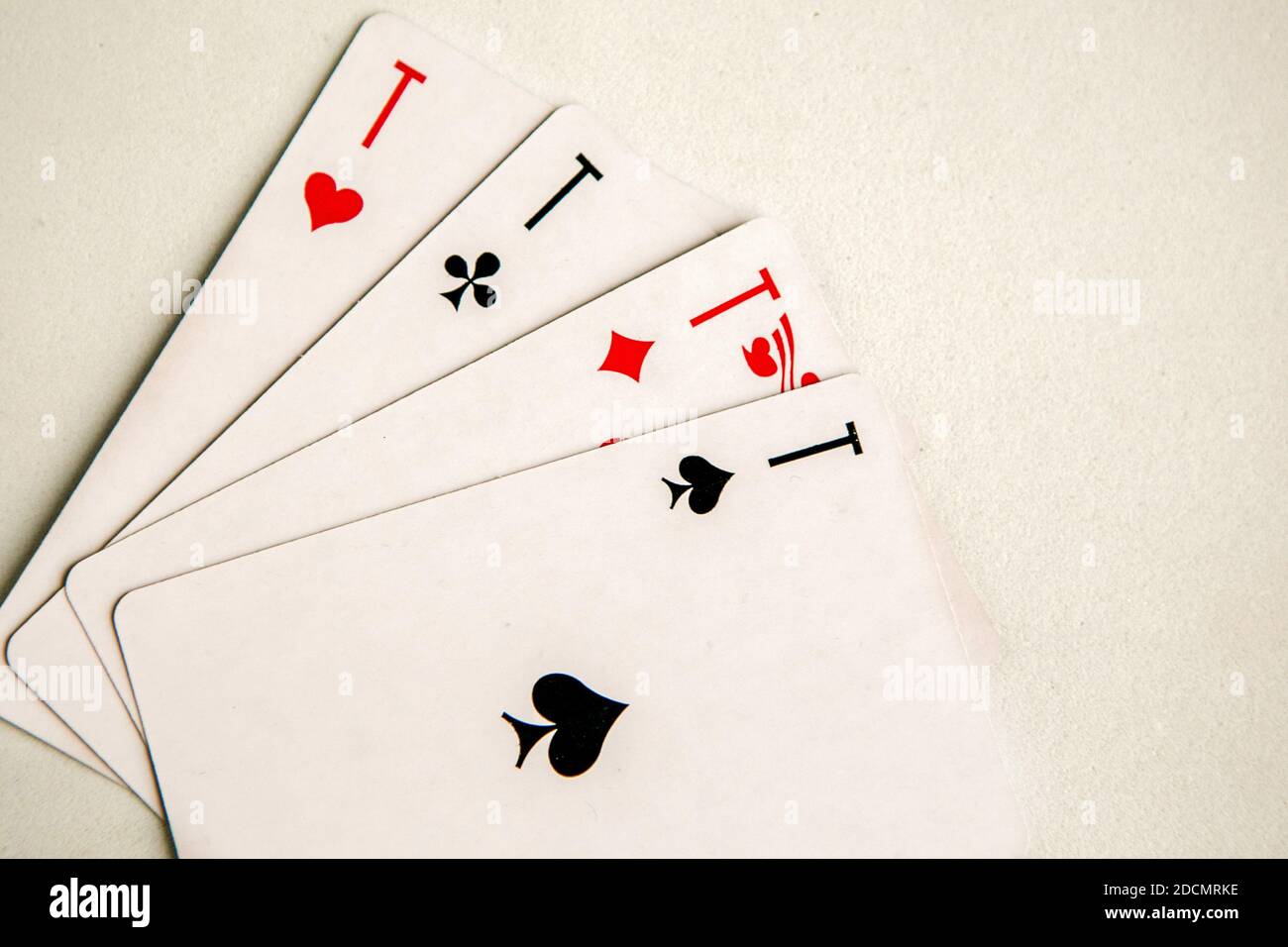 Poker quads playing card, white background Stock Photo Alamy