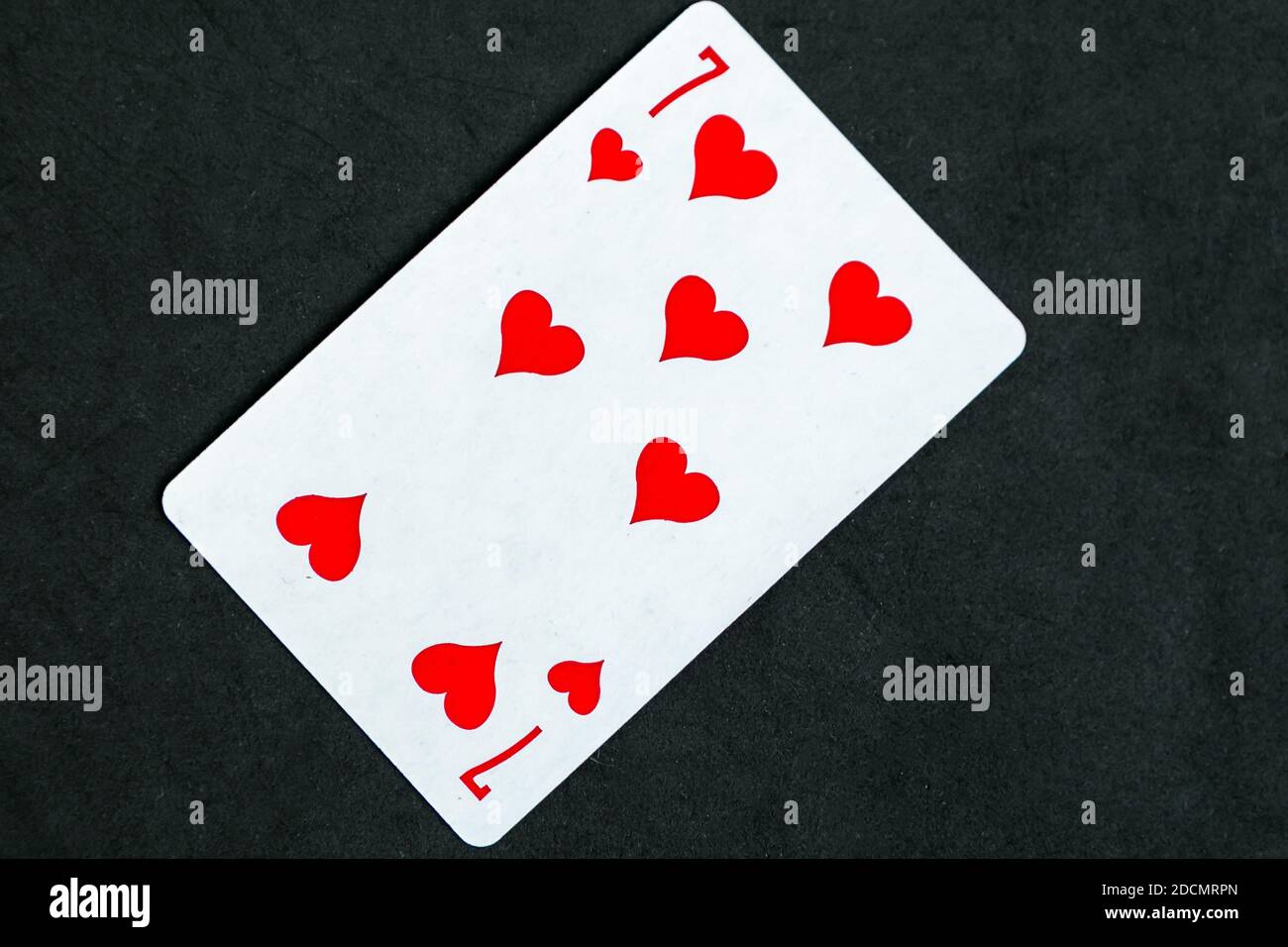 Seven of Hearts playing card, white background Stock Photo - Alamy