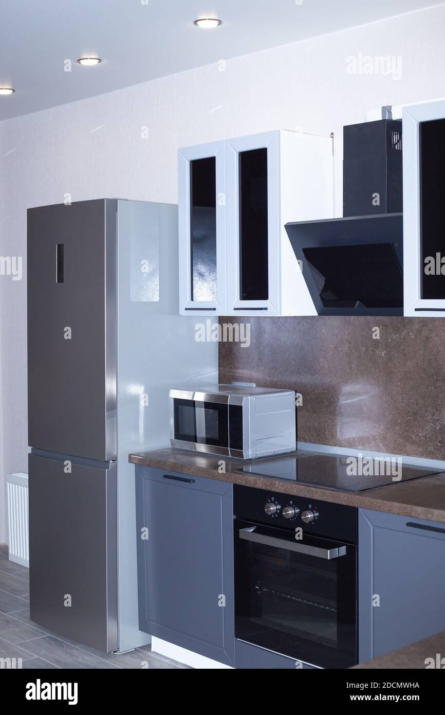 furniture and household appliances in the kitchen, home design and interior. Stock Photo