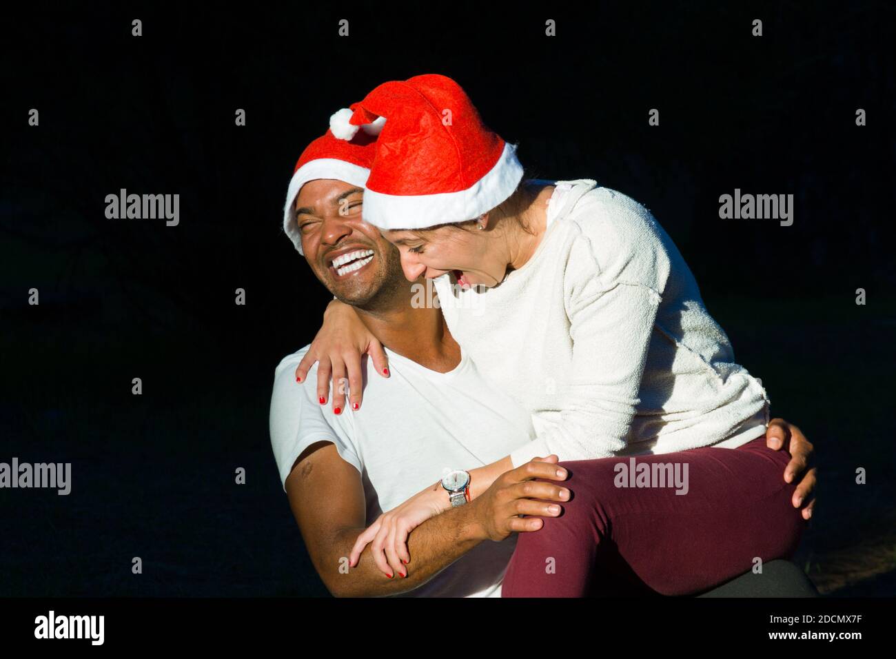 Woman sitting on man lap hi-res stock photography and images - Alamy