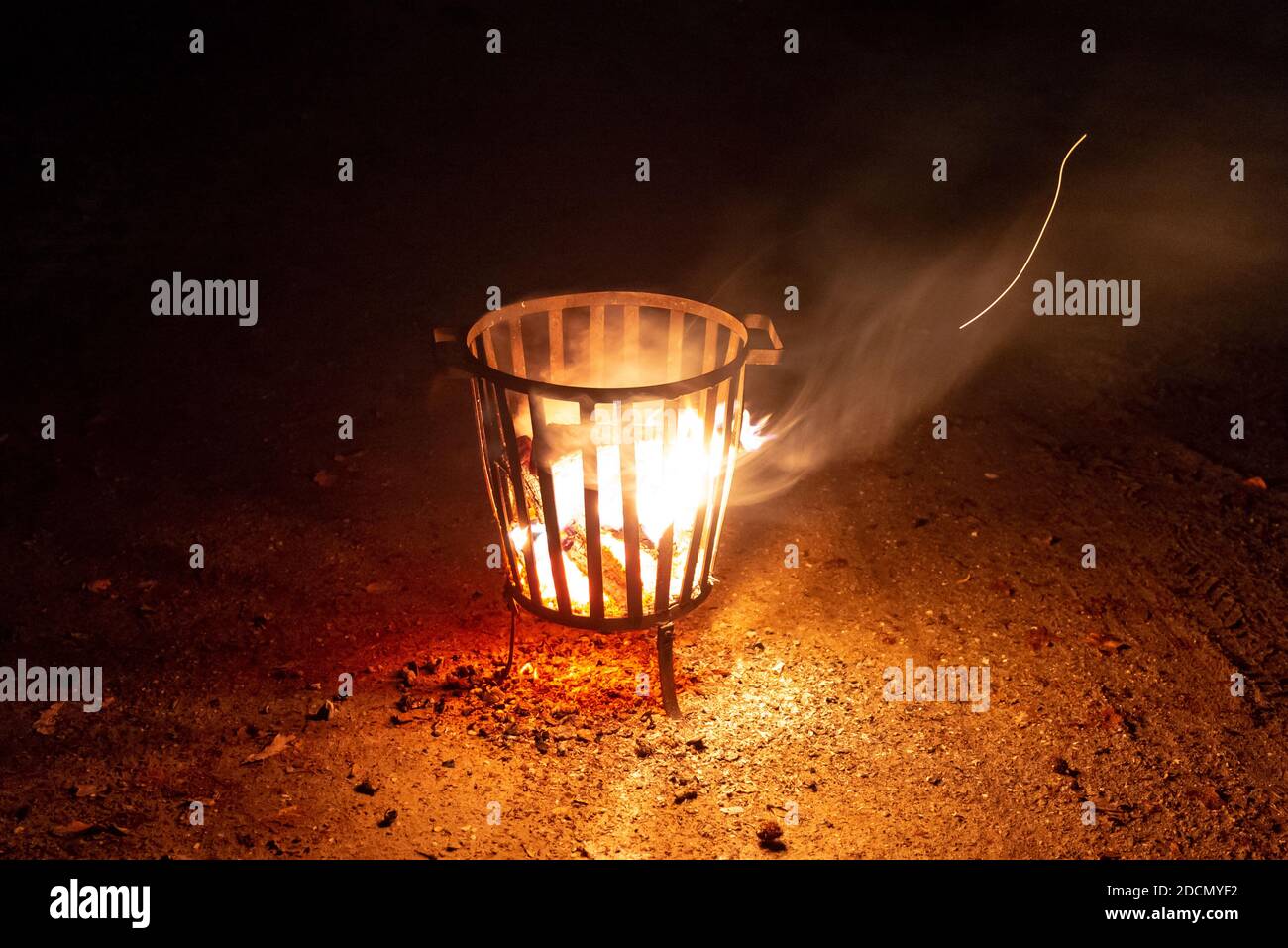 Flames in a fire pit at night Stock Photo