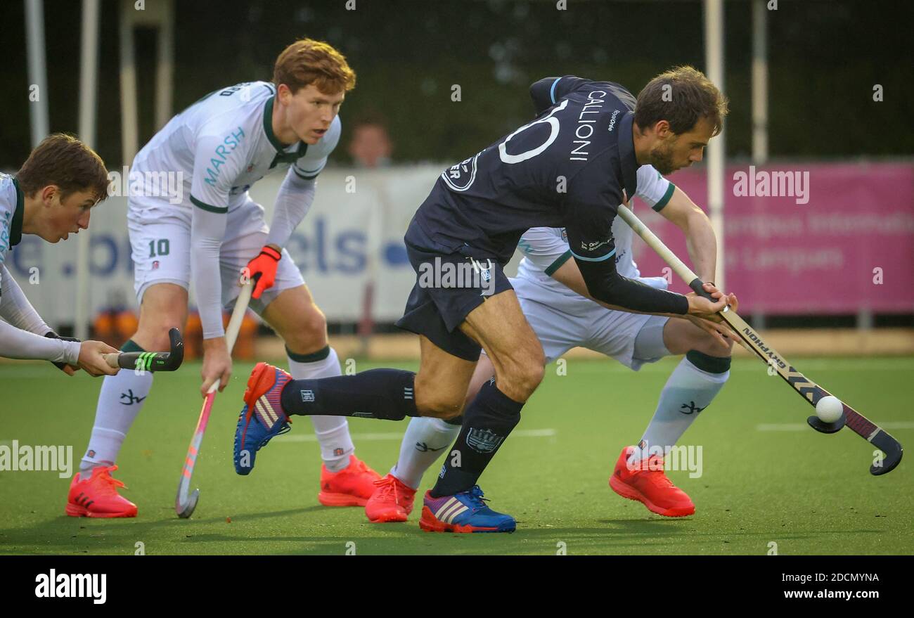 Oree's Facundo Callioni fights for the ball during a hockey game ...