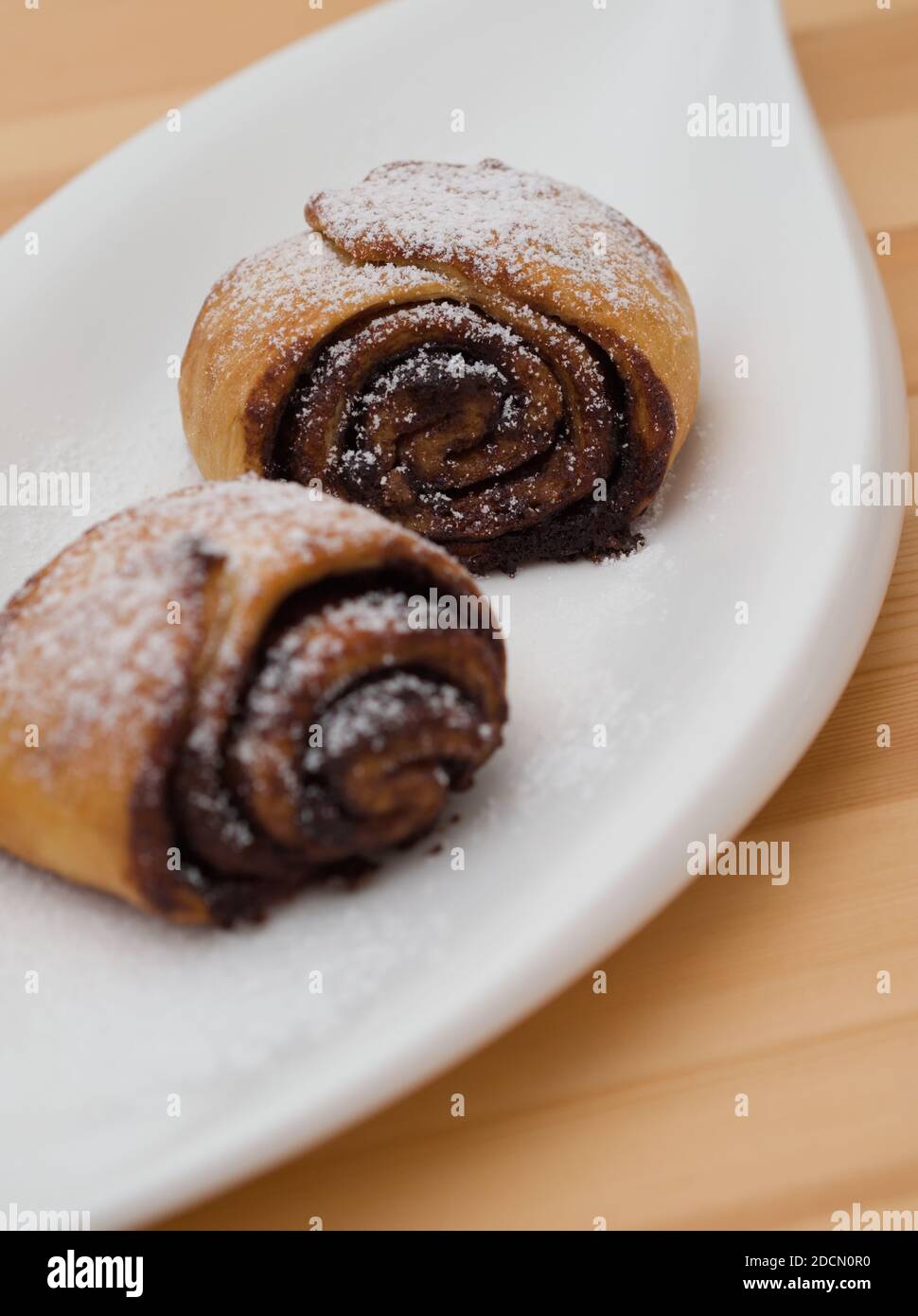Delicious Cocoa Snails on a White Plate Closeup Stock Photo