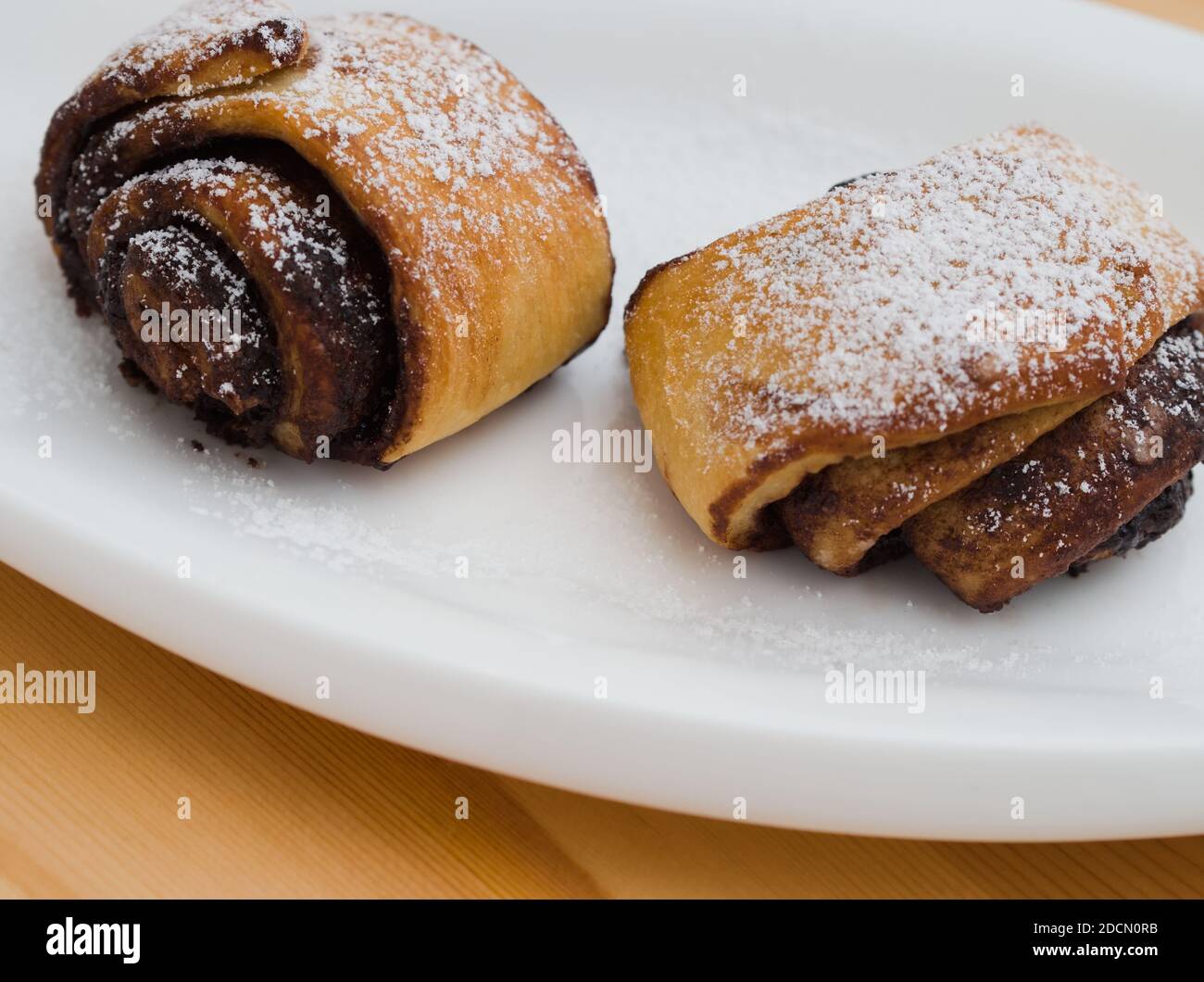 Delicious Cocoa Snails on a White Plate Closeup Stock Photo