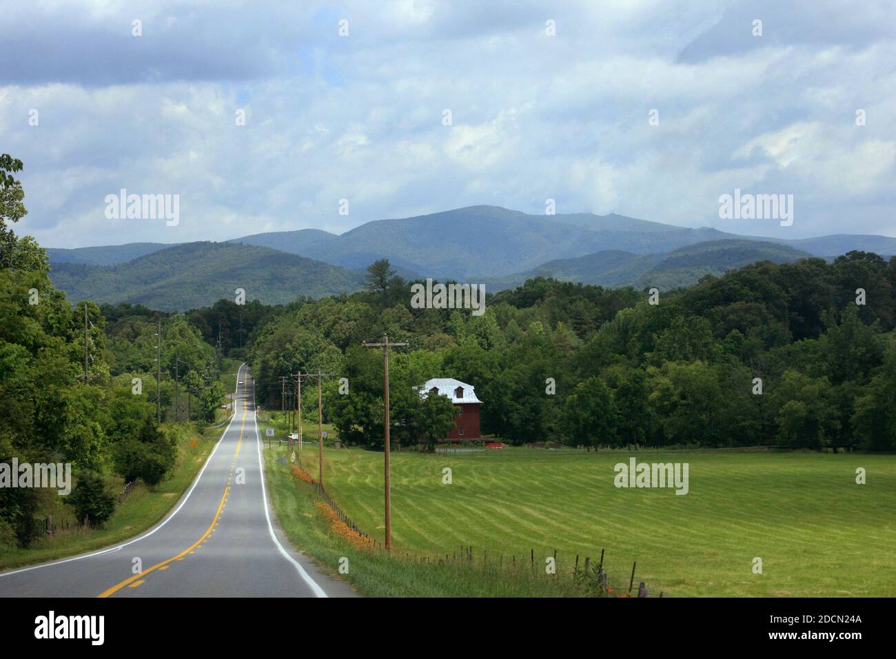 Virginia, USA. Driving through the countryside in the summertime, with view of the Blue Ridge Mountains ahead. Stock Photo