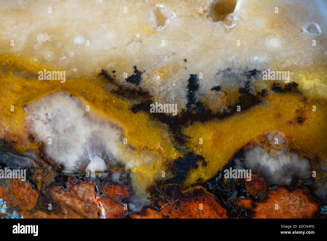 Natural stone - Agate with a white-red-yellow pattern Stock Photo