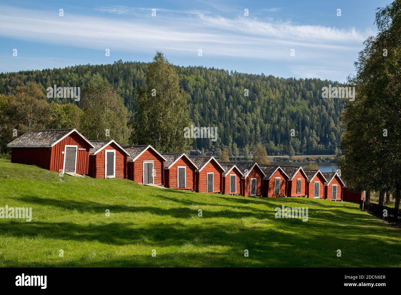 Historic church stables in Nordingrå, Sweden, painted with traditional red pigment paint. Stock Photo