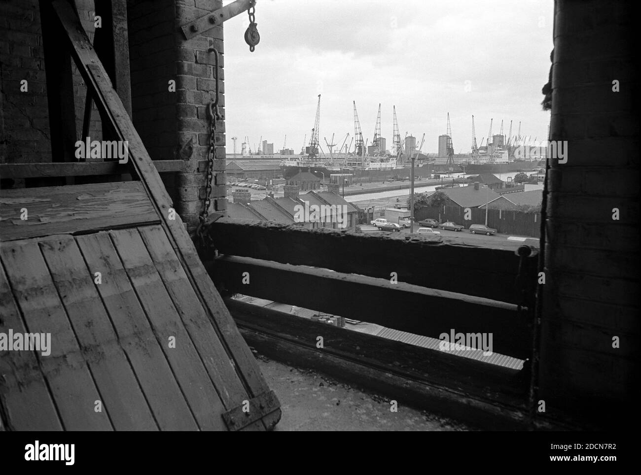 UK, London, Docklands, Isle of Dogs, Coldharbour, 1974. View to South West India Dock. From disused warehouse on Coldharbour - near to The Gun pub. The warehouse is now demolished and new housing built on corner Horatio Place & Coldharbour. Stock Photo