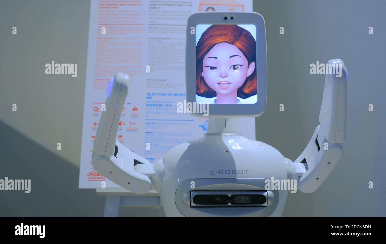 Robot with display tablet woman head Stock Photo
