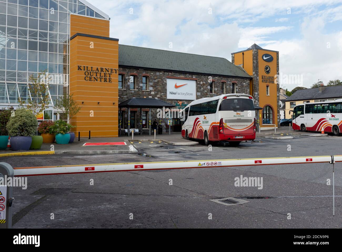 Bus Eireann buses parked at the Killarney Bus station outside Killarney Outlet Centre in Killarney, County Kerry, Ireland as seen in October 2020 Stock Photo