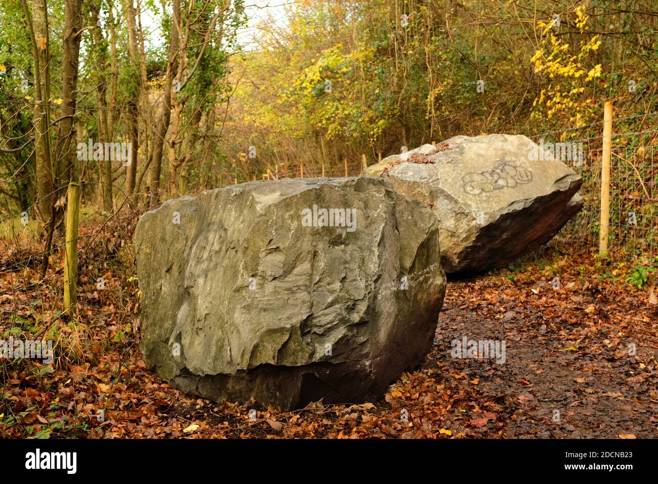 November 2020 - Large boulders placed in a country lane to prevent 4x4 off roaders using it and destroying the delicate local environment Stock Photo