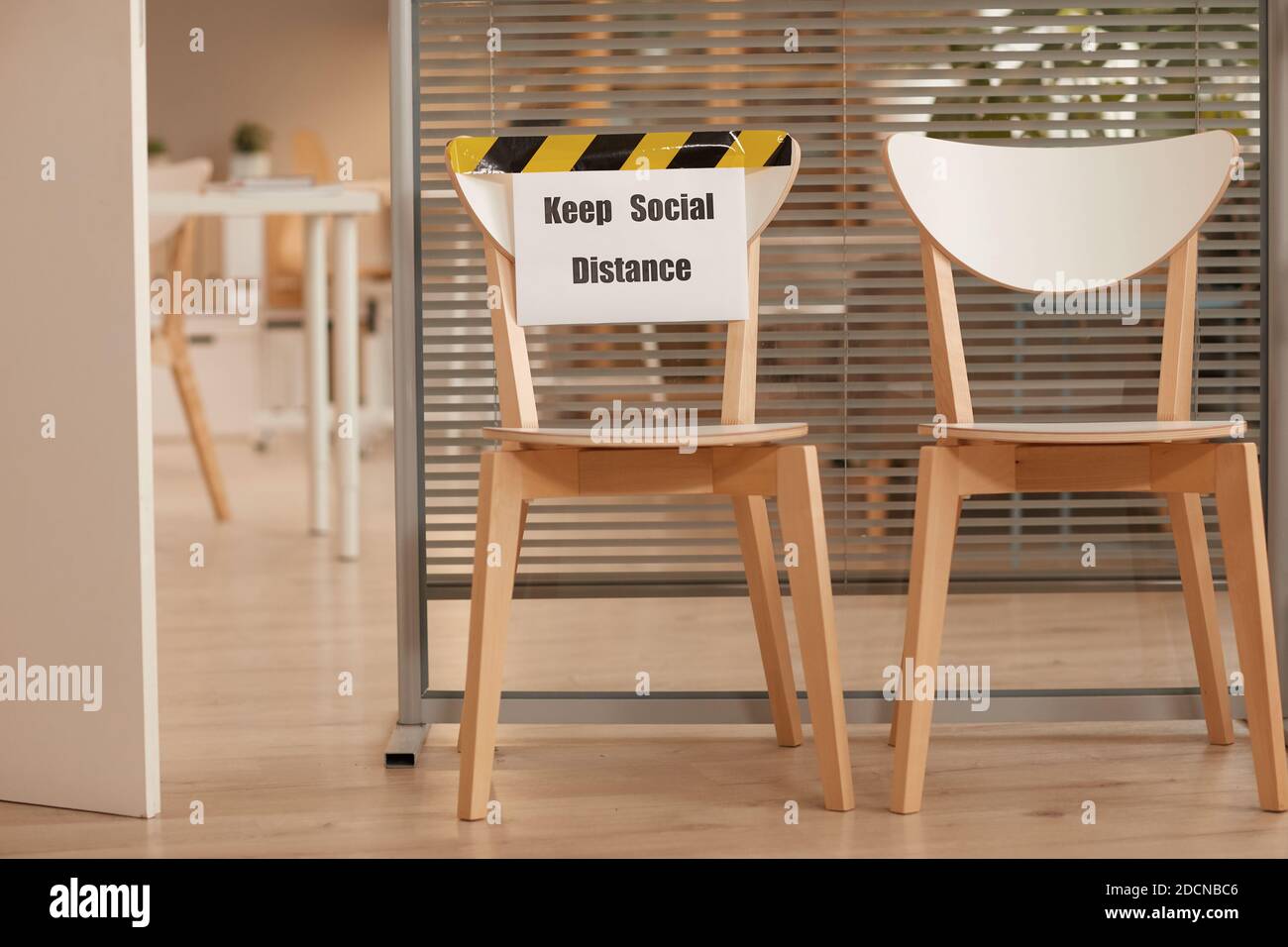 Background image of wooden chairs for waiting in line in office with