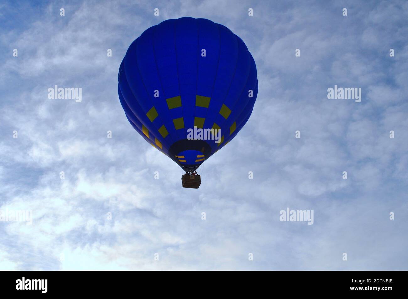 A beautiful shot of a blue hot air balloon against the cloudy sky Stock ...