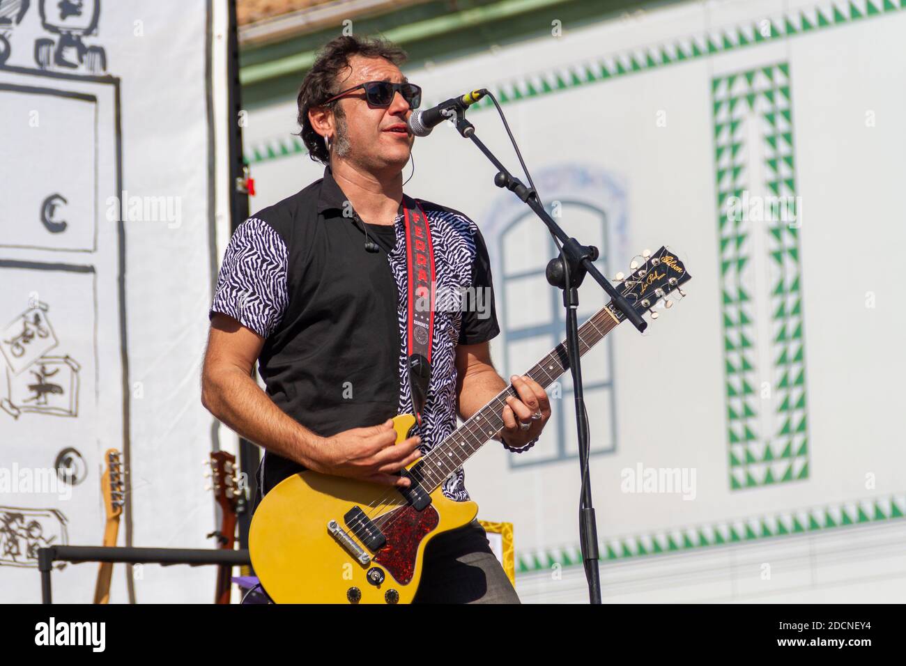 Manises, Valencia, SPAIN - 'Ferran', lead singer and guitarist of the music rock group in Valencian for children Ramonets, during a concert during the Stock Photo