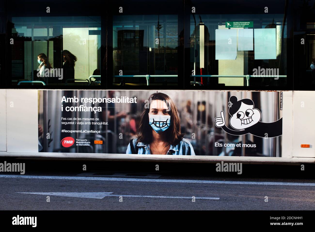 Ad on side of bus asking people to be responsible and trust, Barcelona, Spain. Stock Photo