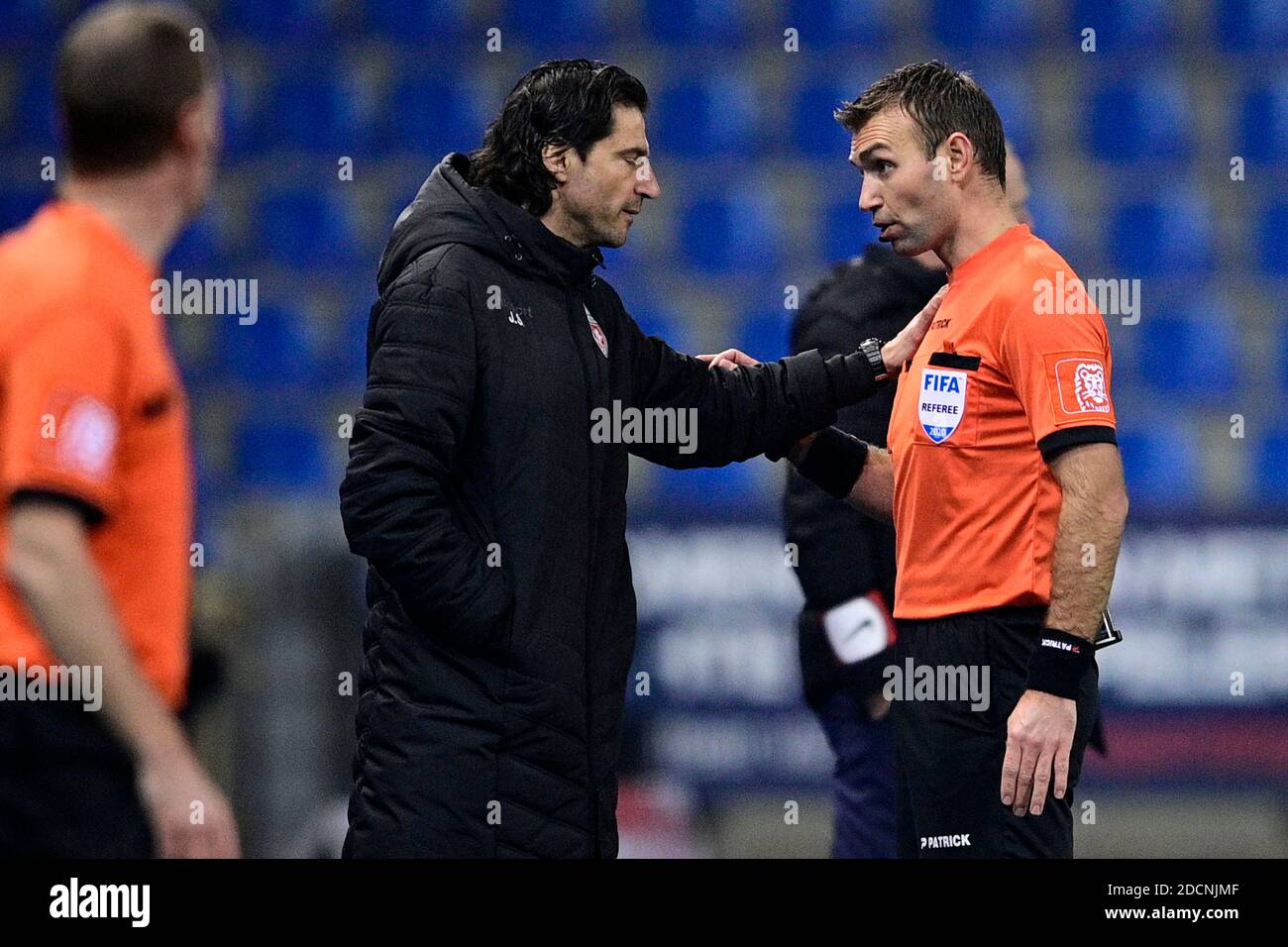 Mouscron's head coach Jorge Simao and referee Nicolas Laforge pictured during a soccer match between KRC Genk and RE Mouscron, Sunday 22 November 2020 Stock Photo