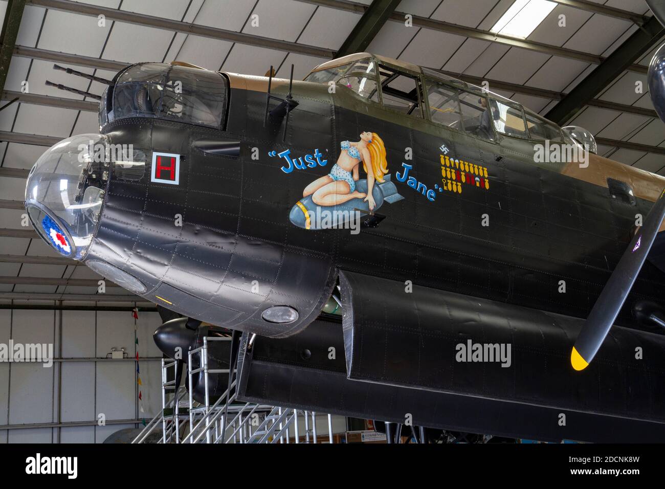 Nose art on the Lancaster bomber (NX611) from WWII, 'Just Jane', Lincolnshire Aviation Heritage Museum, East Kirkby, Spilsby, Lincs, UK. Stock Photo