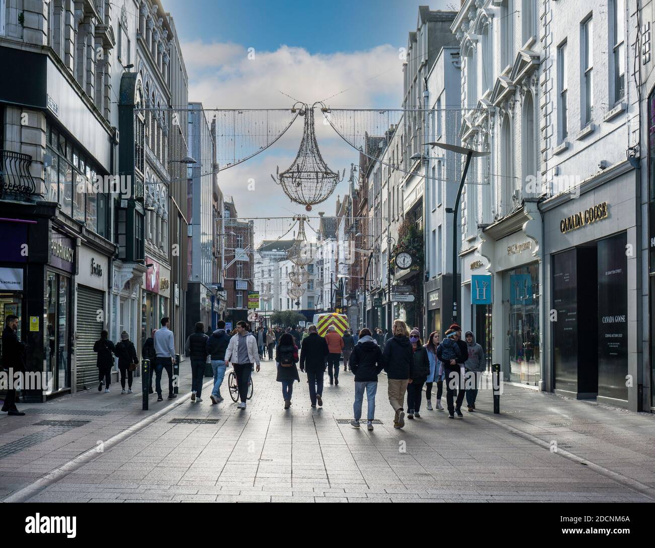 Grafton Street in Dublin, Ireland with the Christmas lights installed. Most stores are closed due to the coronavirus situation. Stock Photo