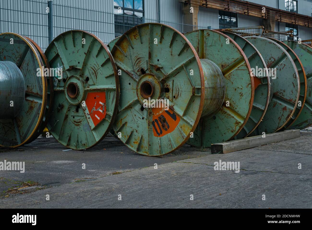 Lots of empty cable drums, an old cable factory, empty cable drums