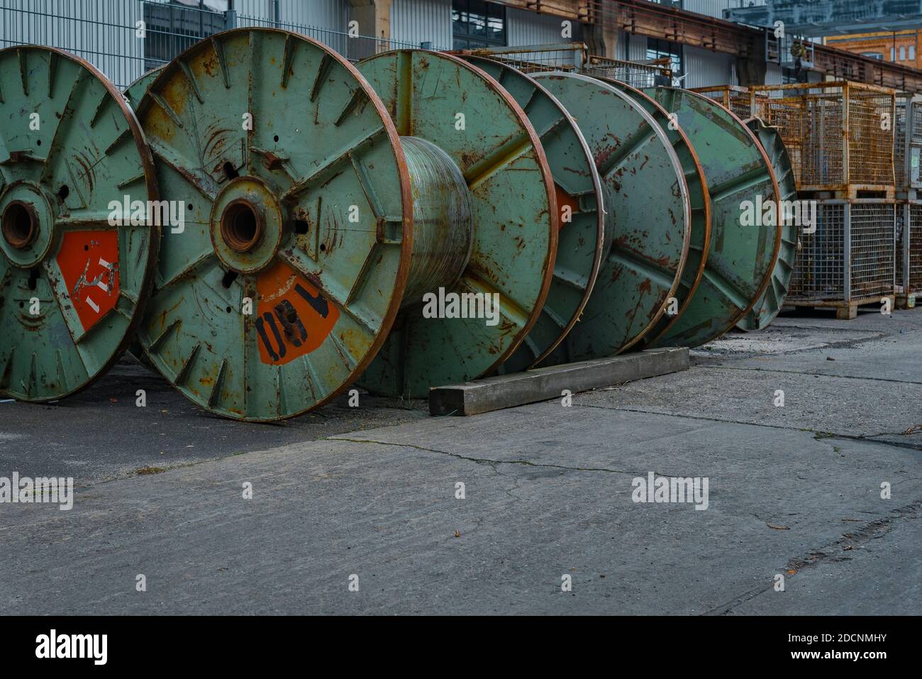 Lots of empty cable drums, an old cable factory, empty cable drums