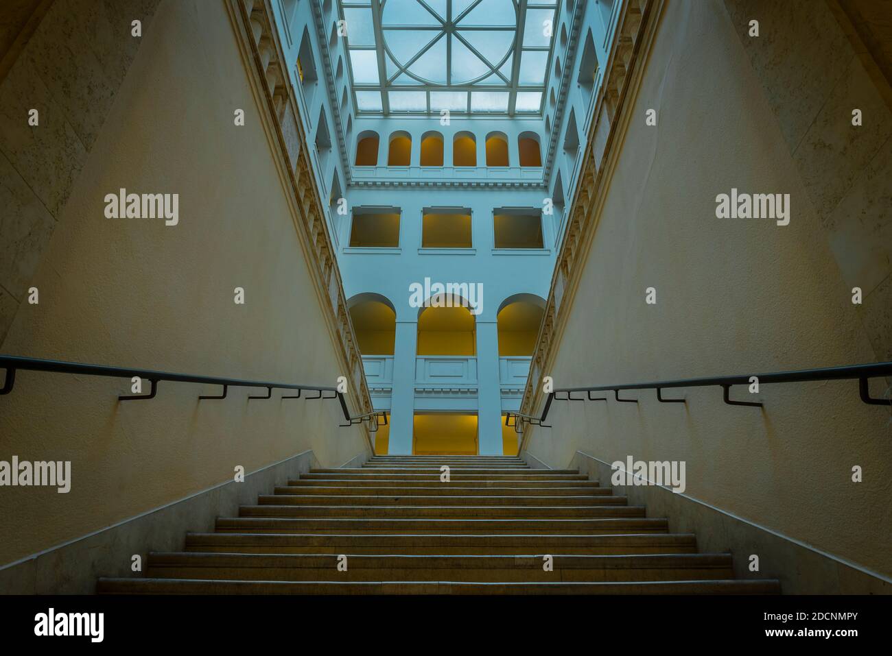 Historic Atrium in Peter Behrens Building Berlin, nice bright Atrium, Atrium with Arches, public building Stock Photo