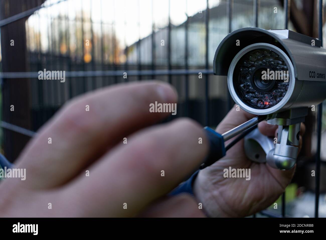 Professional who repairs and installs the surveillance camera Stock