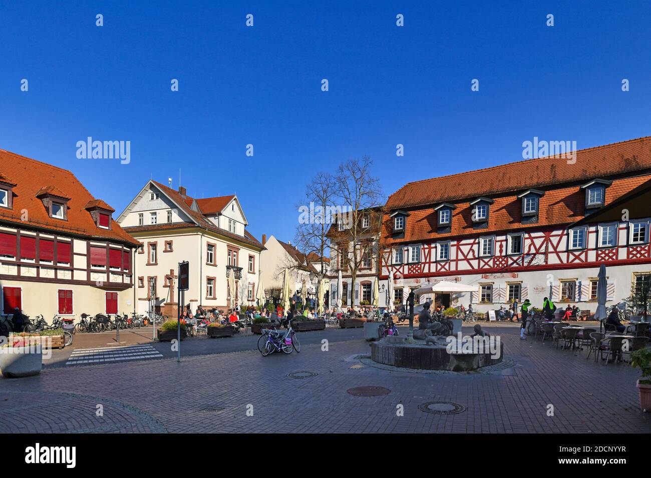 Lorsch, Germany - October 2020: Historic city center of Lorsch with traditional half timbered buildings on sunny day Stock Photo