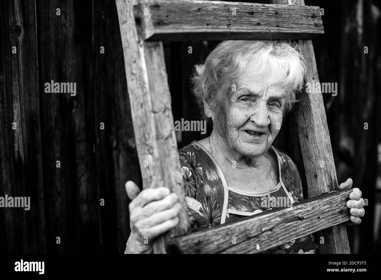 Old wrinkled face woman sitting Black and White Stock Photos & Images ...