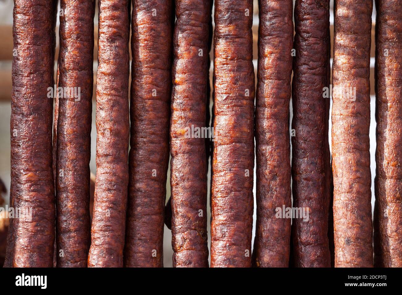 Serbian Kulen Kobasica sausage, handmade, hanging and drying in the coutryside of Serbia. Kulen is a traditional pork sausage, dry and cured, from Cro Stock Photo