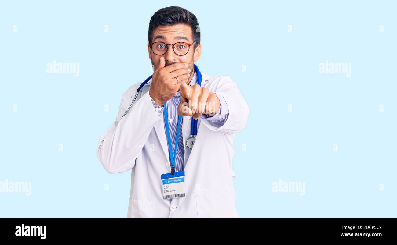 Man doctor laughing pointing finger hi-res stock photography and images ...