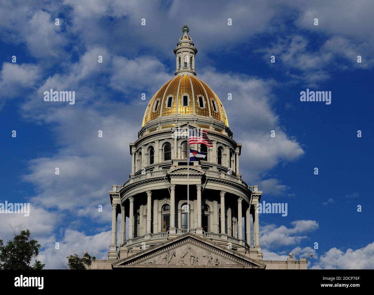 View To The Shimmerig Golden Dome Of The Colorado State Capitol In Denver On A Sunny Summer Day With A Clear Blue Sky And A Few Clouds Stock Photo