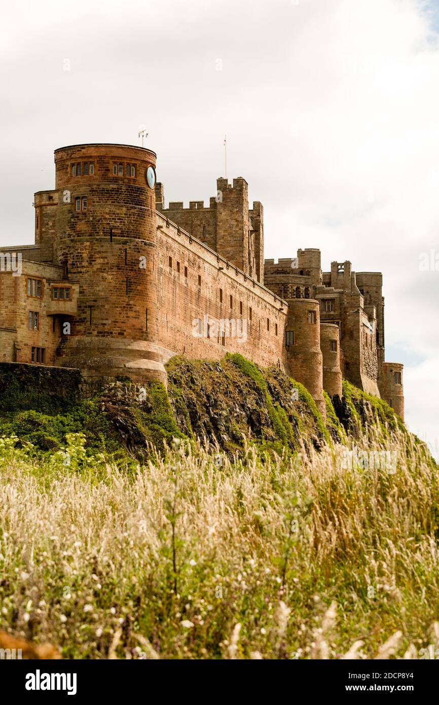 Bamburgh Castle, Northumberland, England. Ancient fortress set atop a hill. Stock Photo