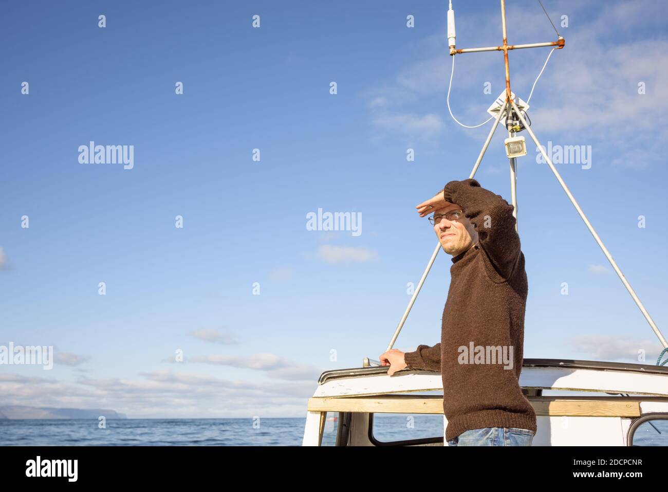 Fisherman standing on boat hi-res stock photography and images - Alamy
