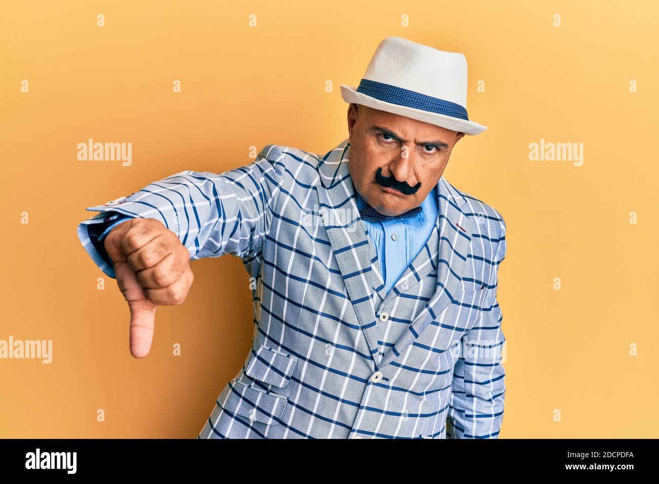 Mature middle east man with mustache wearing vintage and elegant ...