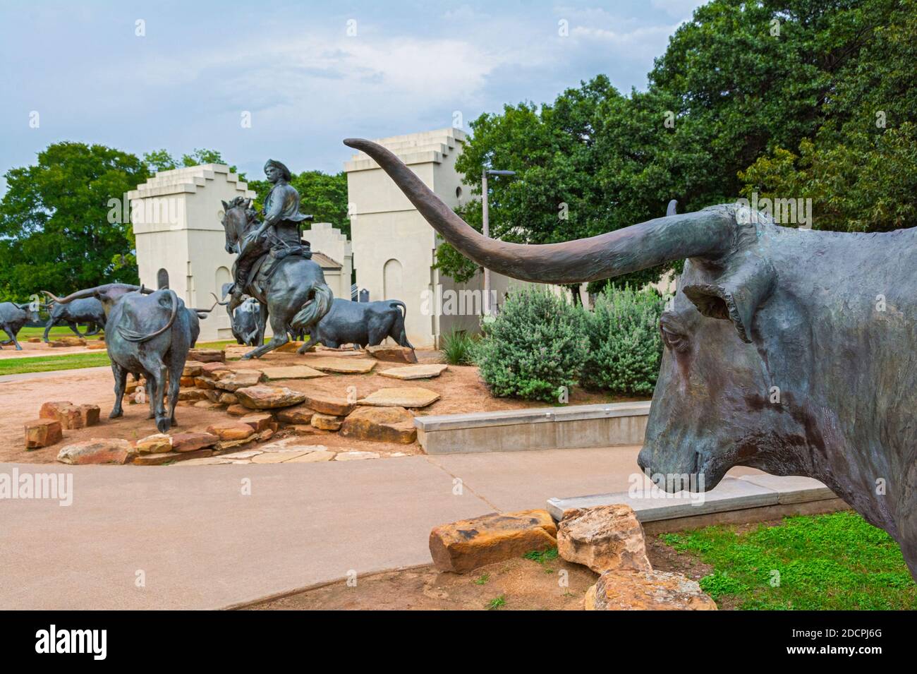 Texas, Waco, Riverwalk, Indian Spring Park, 'Branding the Brazos' sculptures near Suspension Bridge Stock Photo