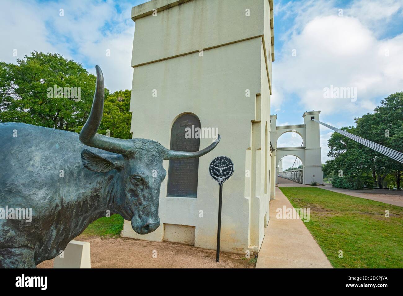 Texas, Waco, Riverwalk, Indian Spring Park, 'Branding the Brazos' sculptures near Suspension Bridge Stock Photo