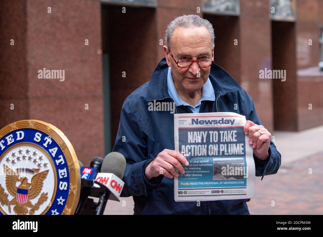 NEW YORK, NY - NOVEMBER 22: U.S. Senator Chuck Schumer speaks during media briefing on COVID-19 and Navy Grumman Plume on November 22, 2020 in New York City. Senator spoke of Navy to contain the Grumman Plume. Schumer asked President-elect transition team to oversee the U. S. Navy to clean up the plume. The Grumman Plume owned by U. S. Navy and Northrop Grumman was contaminated with toxic chemicals since mid 1970th at Bethpage facility sites in Long Island. Senator was holding Newsday newspaper which published an investigative report on The Grumman Plume. Stock Photo