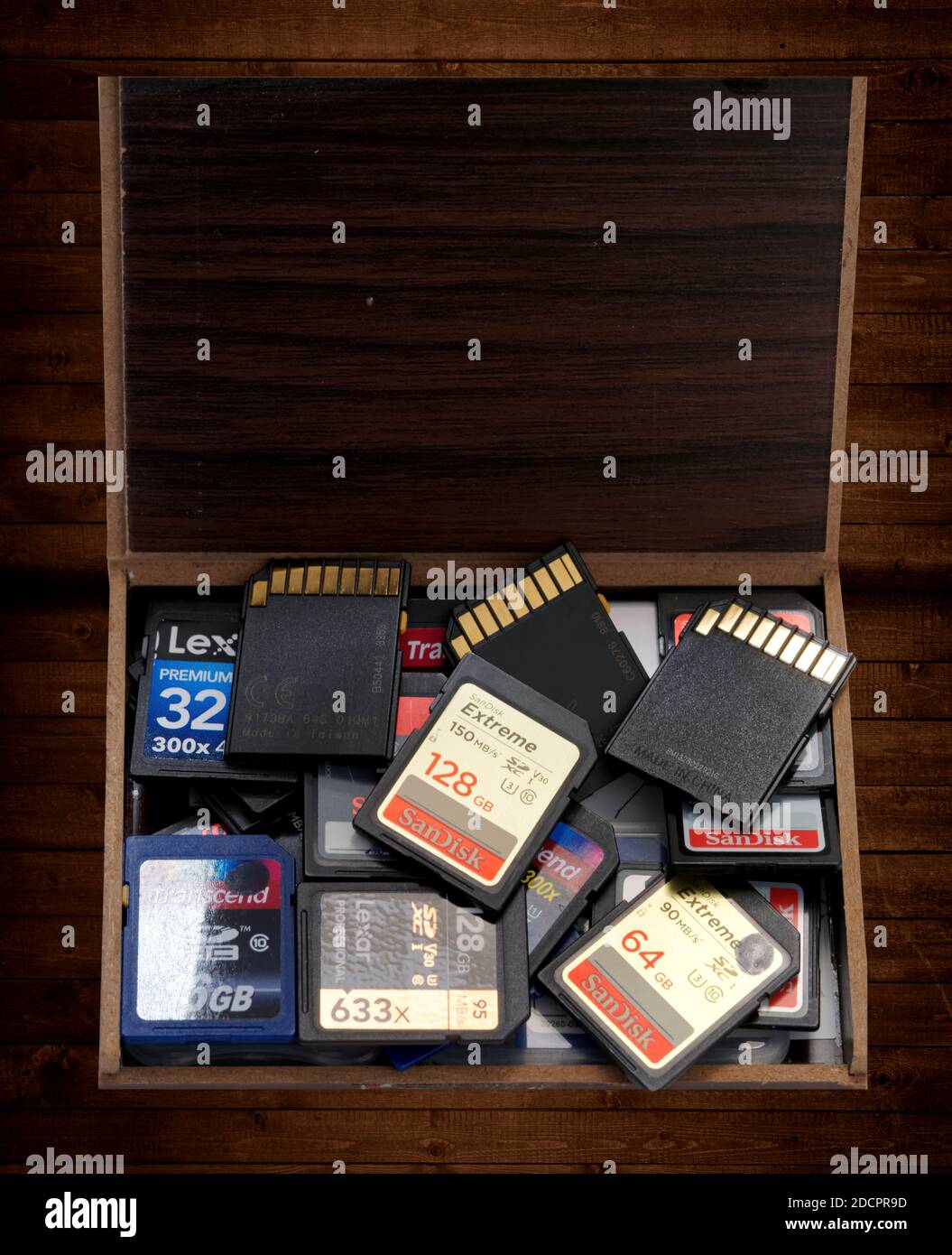 Box with SD memory cards with different sizes and manufacturers Stock