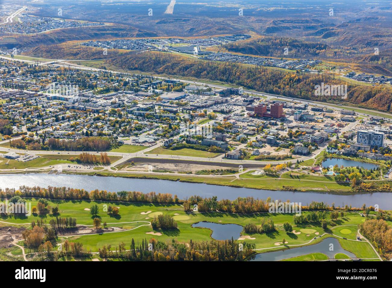 Aerial photo of downtown Fort McMurray, Alberta Canada with Miskanaw Golf Course in the foreground. Stock Photo