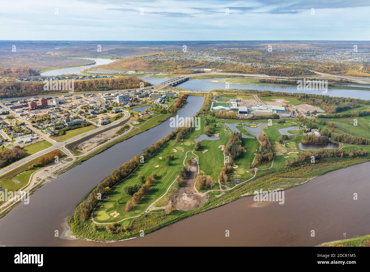 Aerial photo of downtown Fort McMurray and MacDonald Island featuring the Miskanaw golf course. Stock Photo