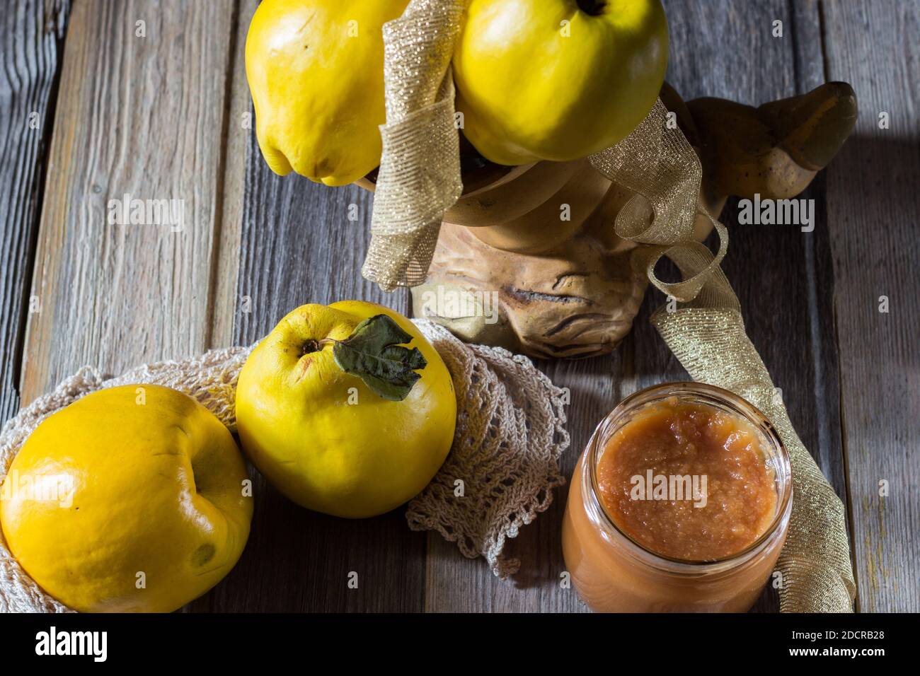 Quince on wooden background. Selective focus. Stock Photo