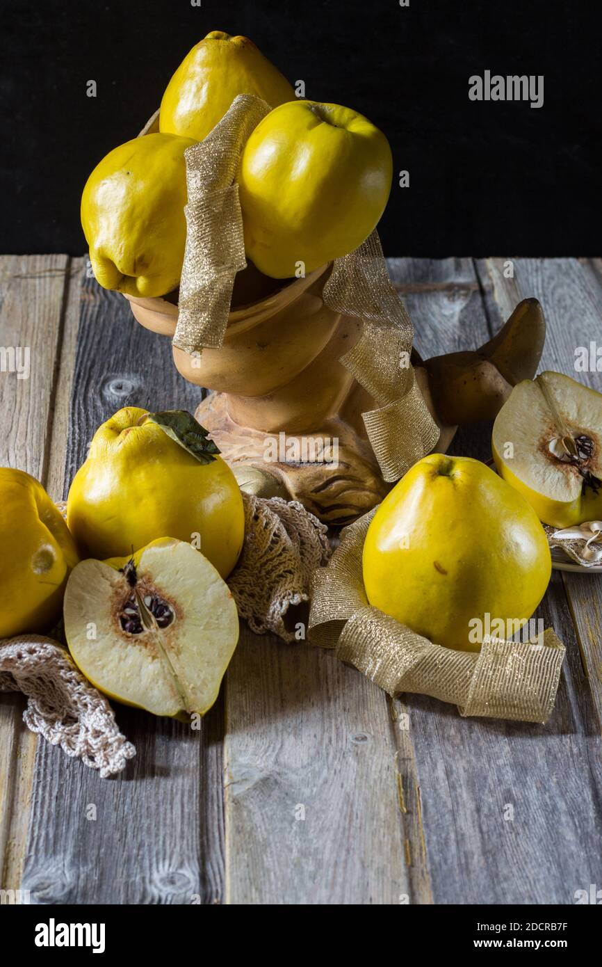 Quince on wooden background. Selective focus. Stock Photo