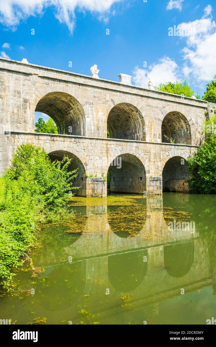 Beautiful old bridge with arches in Tounj on Tounjcica river, Croatia Stock Photo