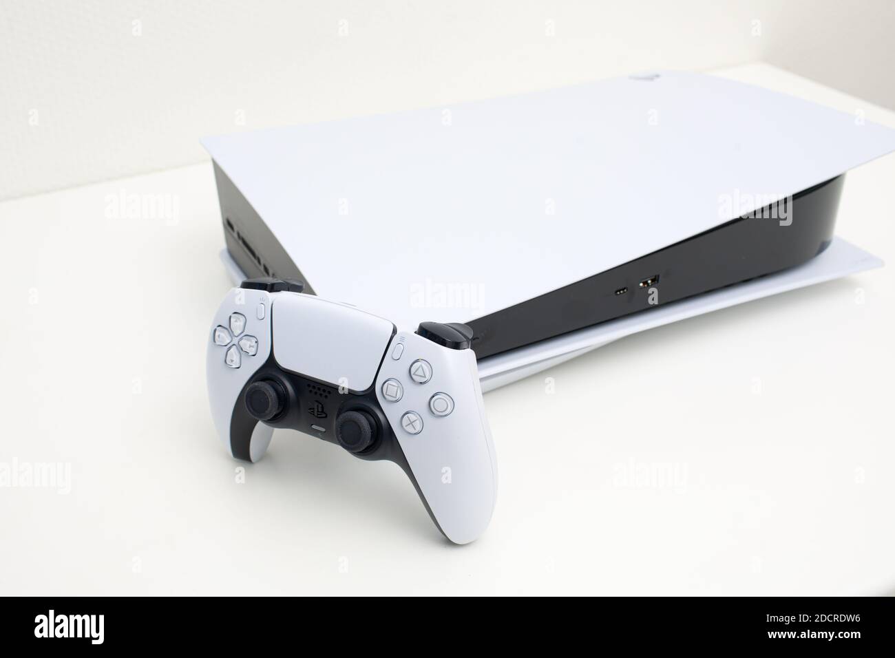 New PlayStation 5 Sony reveals PS5 console and games an ultra futuristic  robot white machine, with gliding lines Stock Photo - Alamy