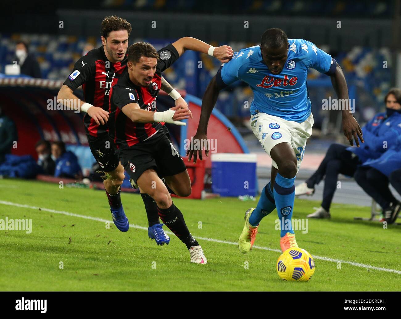 Naples, Italy. 22nd Nov, 2020. Napoli's Senegalese defender Kalidou Koulibaly fights for the ball with AC Milan's Algerian midfielder Ismael Bennacer (C) and AC Milan's Italian defender Davide Calabria (L) during the Serie A football match SSC Napoli vs AC Milan. AC Milan won 3-1. Credit: Independent Photo Agency/Alamy Live News Stock Photo