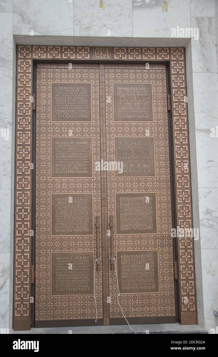 Prayer on doors of Saint Sava Temple (Belgrade, Serbia) in different World languages: O Heavenly King, the Comforter, the Spirit of Truth Stock Photo