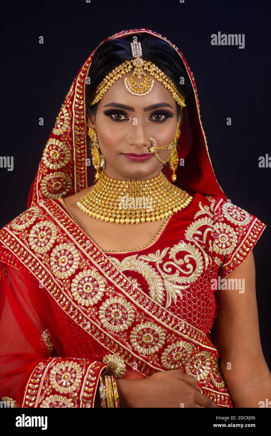 Young attractive Indian female model dressed in traditional Indian